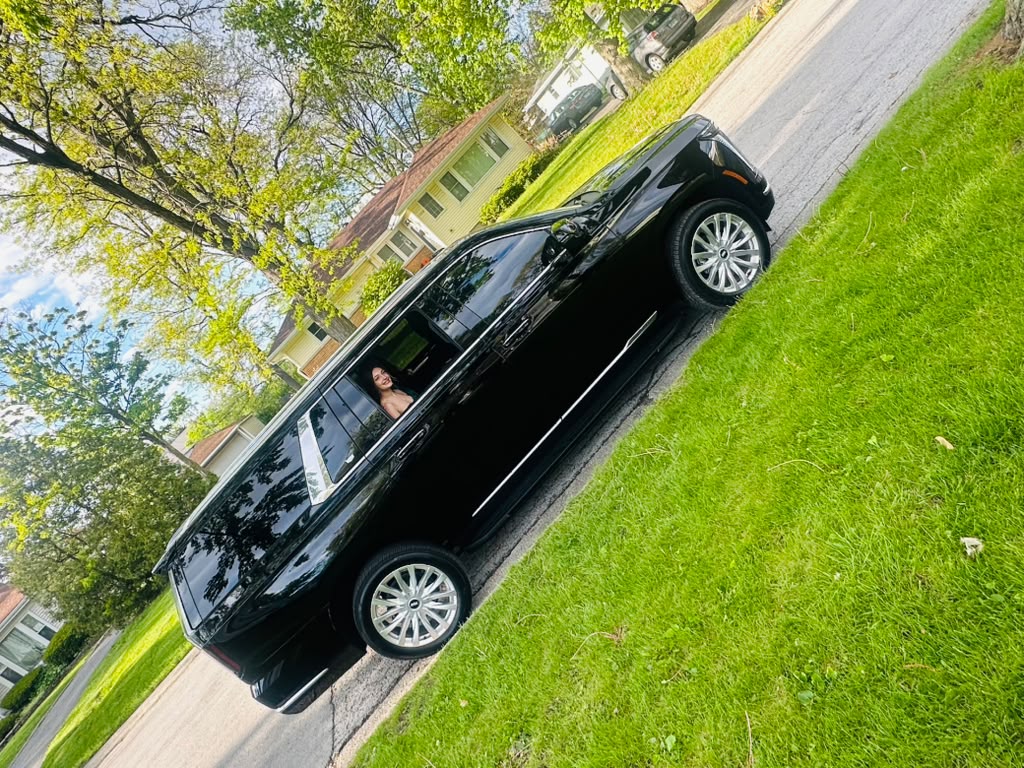 Client seated inside the vehicle before prom