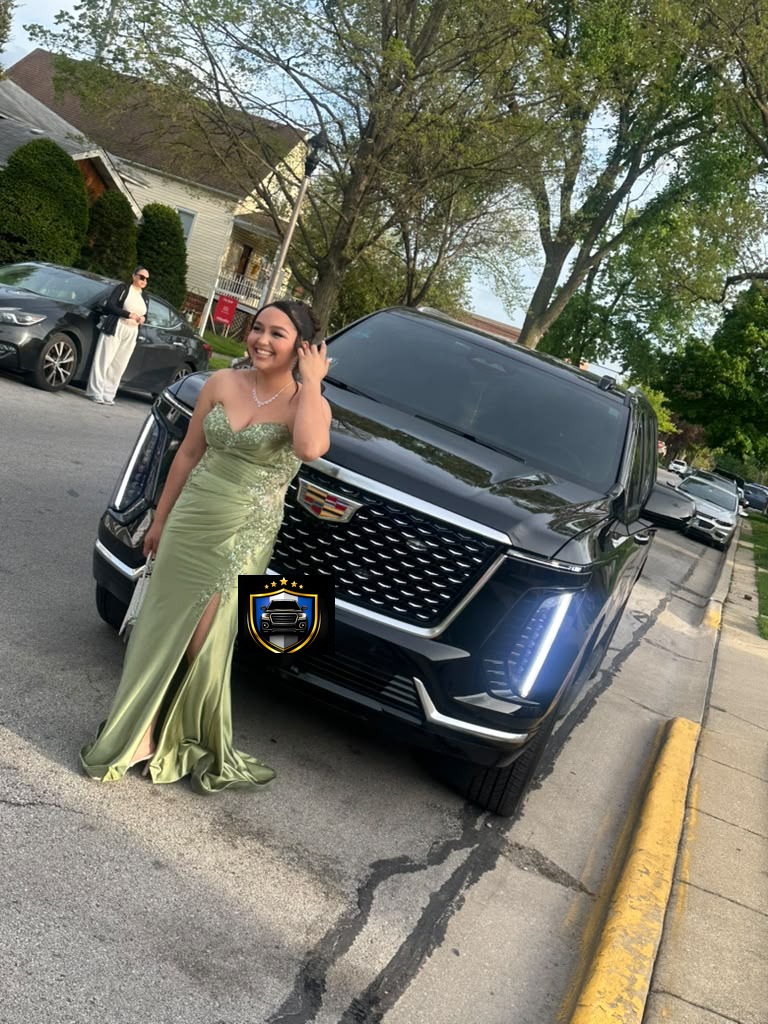 Prom client posing in front of the vehicle