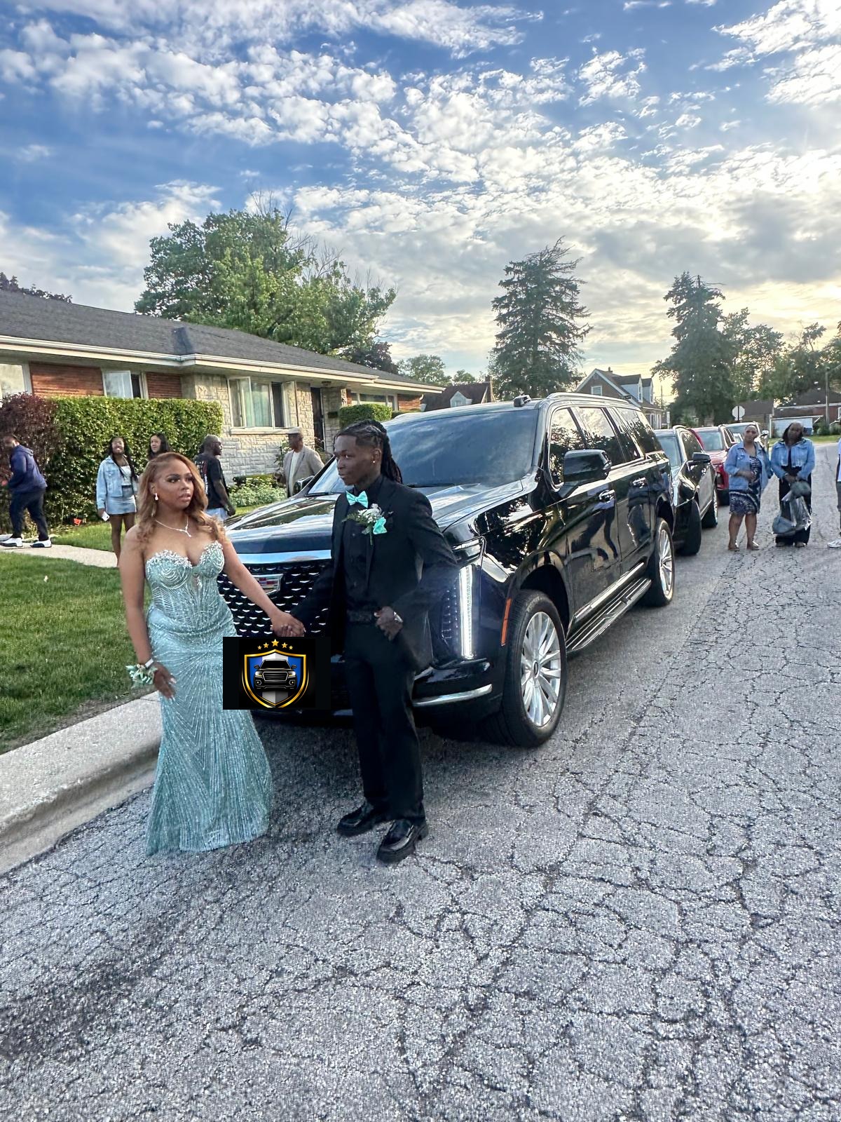 Prom couple stepping out of the vehicle
